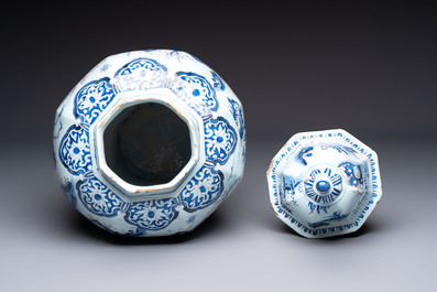 An exceptional blue, white and manganese Dutch Delft Transitional style chinoiserie vase and cover, 17th C.