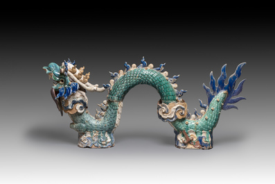 A pair of large Chinese polychrome-glazed Shiwan stoneware dragons, 19th C.