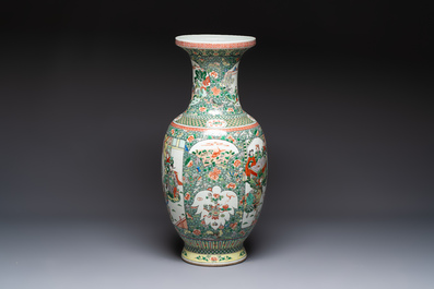 A large Chinese famille verte vase with narrative design, 19th C.