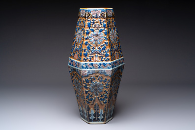A rare Chinese hexagonal copper-red, blue and white brown-ground vase, 19th C.