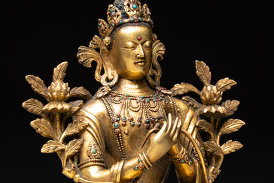 A fine Sino-Tibetan turquoise- and coral-inlaid gilt-bronze Buddha Maitreya, Kangxi