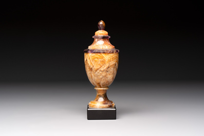 An English Blue John urn on black marble base, ca. 1900