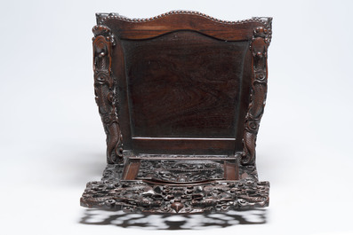 A richly carved Chinese hongmu 'dragon' armchair, Canton, 19th C.