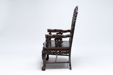 A richly carved Chinese hongmu 'dragon' armchair, Canton, 19th C.