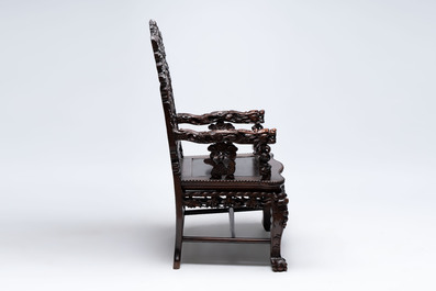 A richly carved Chinese hongmu 'dragon' armchair, Canton, 19th C.