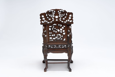 A richly carved Chinese hongmu 'dragon' armchair, Canton, 19th C.