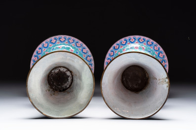A pair of Chinese Canton enamel 'gu' vases with floral design, Qianlong