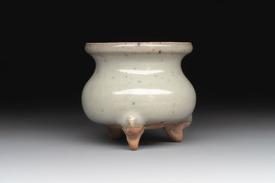 A small Chinese green-glazed 'jun' tripod censer, Hebi kilns, Song/Yuan
