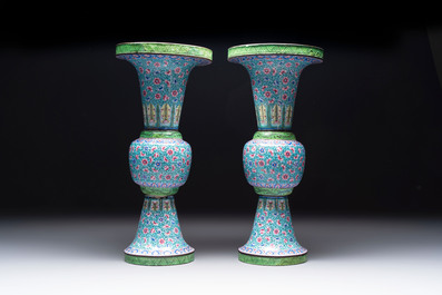 A pair of Chinese Canton enamel 'gu' vases with floral design, Qianlong
