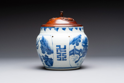 A Chinese blue and white 'qilin' jar and wooden cover, Transitional period