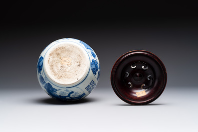 A Chinese blue and white 'qilin' jar and wooden cover, Transitional period