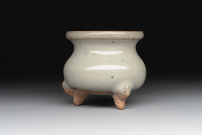 A small Chinese green-glazed 'jun' tripod censer, Hebi kilns, Song/Yuan