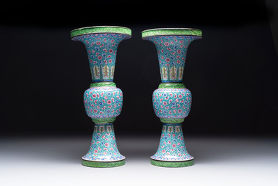 A pair of Chinese Canton enamel 'gu' vases with floral design, Qianlong