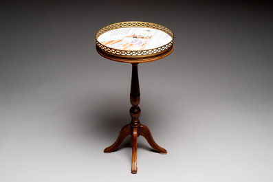 A Chinese famille rose 'poem' plaque mounted as a gu&eacute;ridon, 19th C.