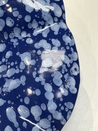 A Nevers white-splashed blue-ground '&agrave; la bougie' dish, France, late 17th C.