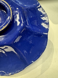 A Nevers white-splashed blue-ground '&agrave; la bougie' dish, France, late 17th C.