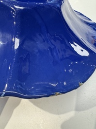 A Nevers white-splashed blue-ground '&agrave; la bougie' dish, France, late 17th C.