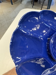 A Nevers white-splashed blue-ground '&agrave; la bougie' dish, France, late 17th C.