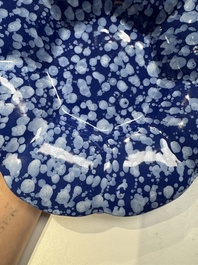 A Nevers white-splashed blue-ground '&agrave; la bougie' dish, France, late 17th C.