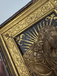 A rare rhombus-shaped Malines alabaster carving with the bust of Christ, attributed to Tobias Tissenaken, late 16th C.