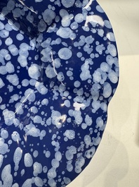 A Nevers white-splashed blue-ground '&agrave; la bougie' dish, France, late 17th C.