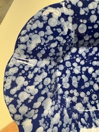 A Nevers white-splashed blue-ground '&agrave; la bougie' dish, France, late 17th C.