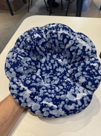 A Nevers white-splashed blue-ground '&agrave; la bougie' dish, France, late 17th C.