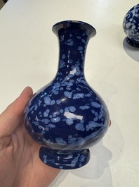 A pair of Nevers white-splashed blue-ground '&agrave; la bougie' vases, France, late 17th C.