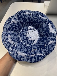 A Nevers white-splashed blue-ground '&agrave; la bougie' dish, France, late 17th C.