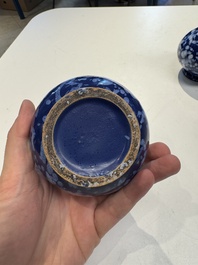 A pair of Nevers white-splashed blue-ground '&agrave; la bougie' vases, France, late 17th C.