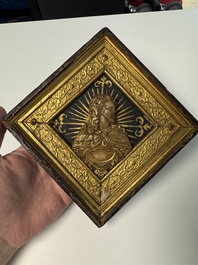 A rare rhombus-shaped Malines alabaster carving with the bust of Christ, attributed to Tobias Tissenaken, late 16th C.
