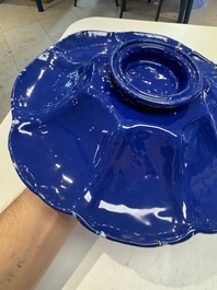 A Nevers white-splashed blue-ground '&agrave; la bougie' dish, France, late 17th C.
