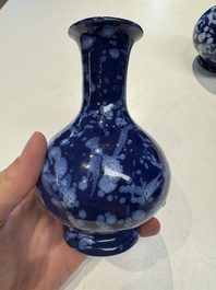 A pair of Nevers white-splashed blue-ground '&agrave; la bougie' vases, France, late 17th C.