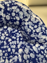 A Nevers white-splashed blue-ground '&agrave; la bougie' dish, France, late 17th C.