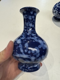 A pair of Nevers white-splashed blue-ground '&agrave; la bougie' vases, France, late 17th C.