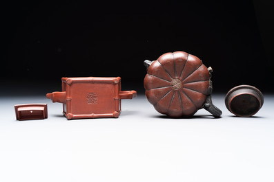Seven Chinese Yixing stoneware teapots, two cups and a covered box, 20th C.