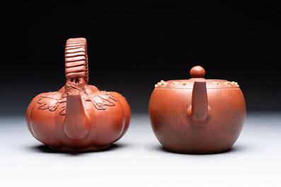 Seven Chinese Yixing stoneware teapots, two cups and a covered box, 20th C.