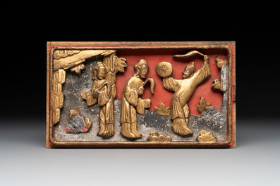 11 Chinese gilt-lacquered carved wooden panels with narrative design, 19th C.