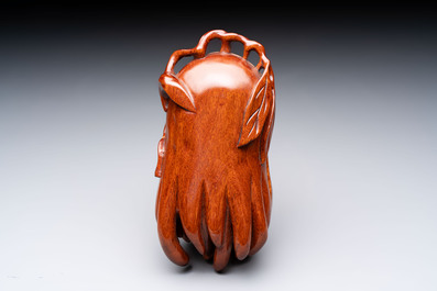 12 various Chinese carved huali and hongmu fruit-form covered boxes, 20th C.