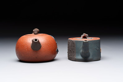 Seven Chinese Yixing stoneware teapots, two cups and a covered box, 20th C.
