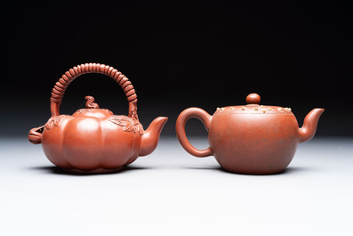 Seven Chinese Yixing stoneware teapots, two cups and a covered box, 20th C.