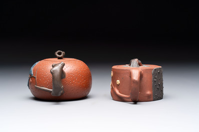 Seven Chinese Yixing stoneware teapots, two cups and a covered box, 20th C.