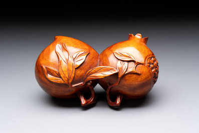 12 various Chinese carved huali and hongmu fruit-form covered boxes, 20th C.