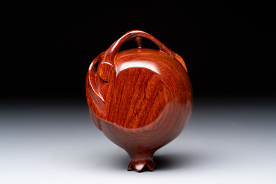 12 various Chinese carved huali and hongmu fruit-form covered boxes, 20th C.