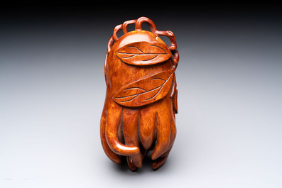 12 various Chinese carved huali and hongmu fruit-form covered boxes, 20th C.