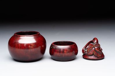12 various Chinese carved huali and hongmu fruit-form covered boxes, 20th C.