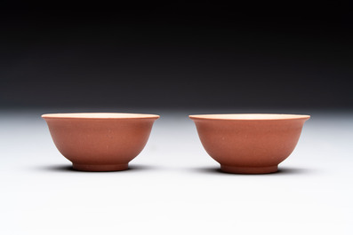 Seven Chinese Yixing stoneware teapots, two cups and a covered box, 20th C.