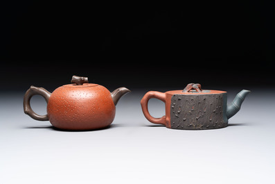 Seven Chinese Yixing stoneware teapots, two cups and a covered box, 20th C.