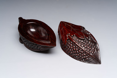 12 various Chinese carved huali and hongmu fruit-form covered boxes, 20th C.