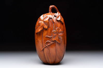 12 various Chinese carved huali and hongmu fruit-form covered boxes, 20th C.
